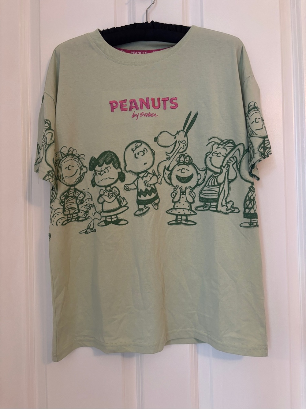 Peanuts - Light Green Graphic Tee with Pink Logo. Size XS, Cotton Blend